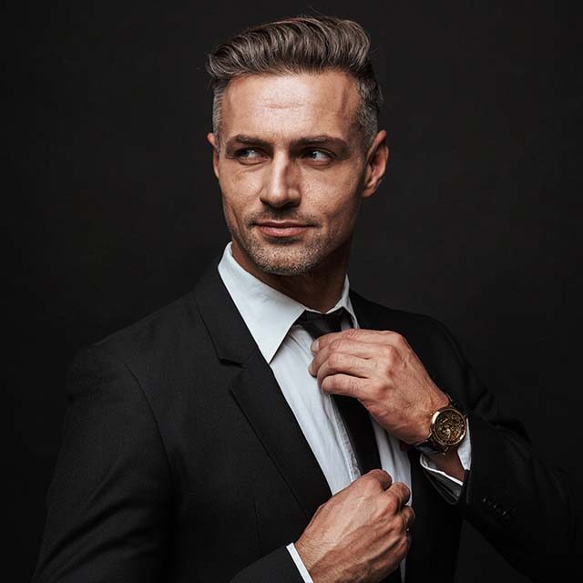handsome-confident-businessman-wearing-suit-standing-isolated-black-wall-posing handsome-confident-businessman-wearing-suit-standing-isolated-black-wall-posing